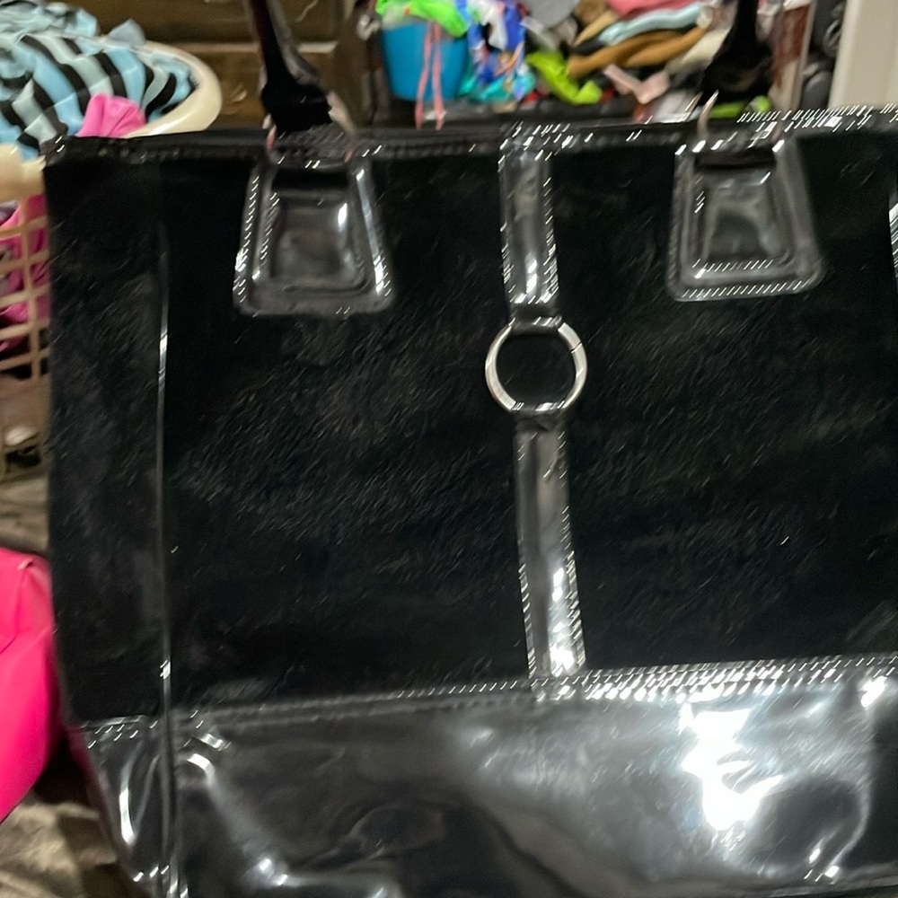 Essence of Beauty bag. Bottom is waterproof. New without tag. Great computer bag